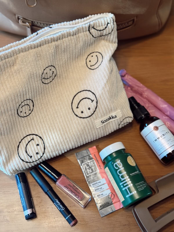 smiley face bag of womens essentials